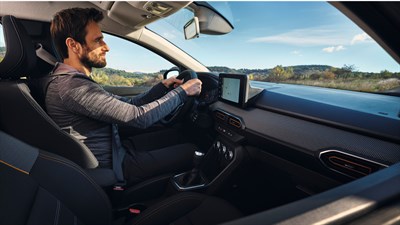 a man driving the dacia sandora stepway